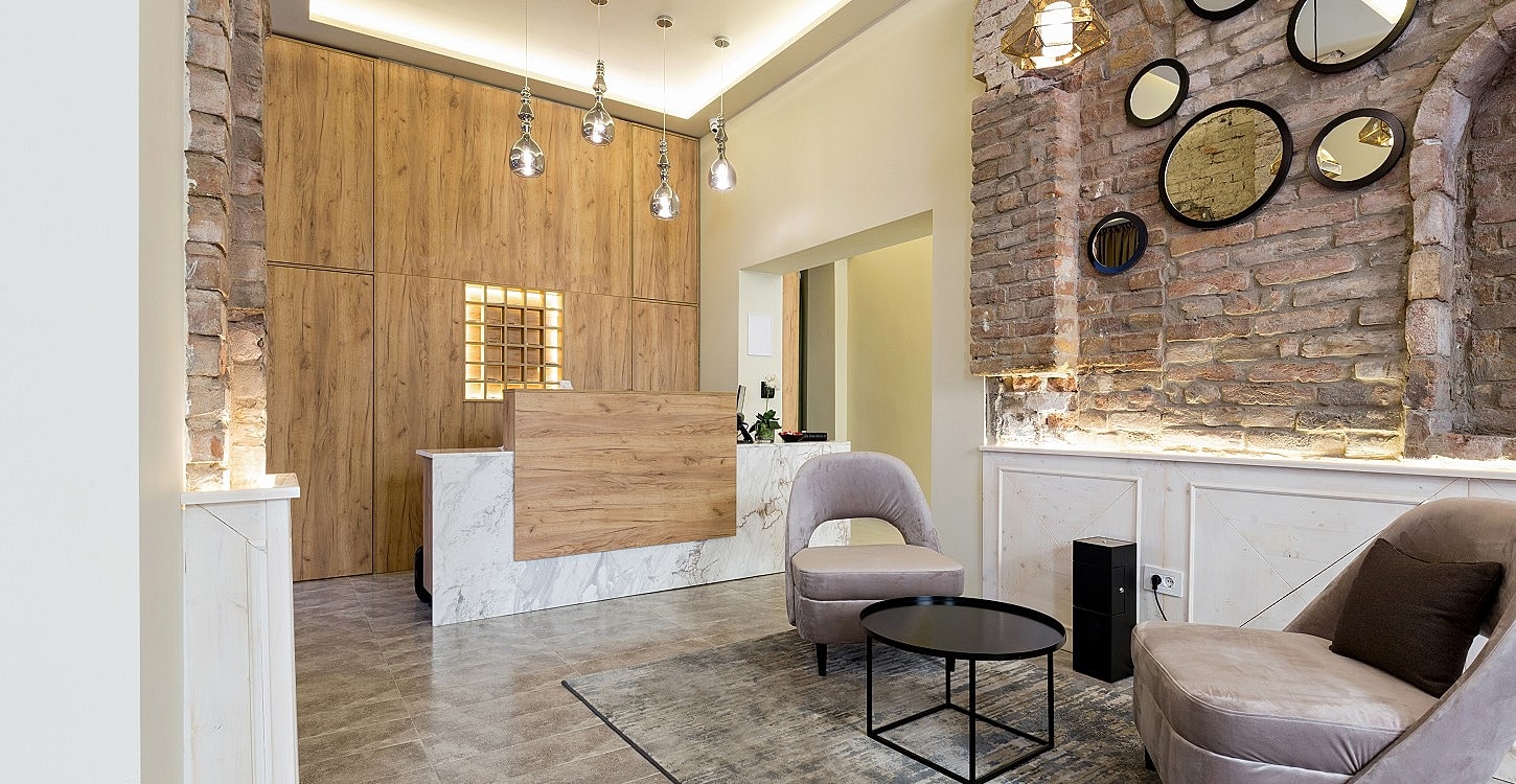 Modern hotel lobby with stylish seating and decor.